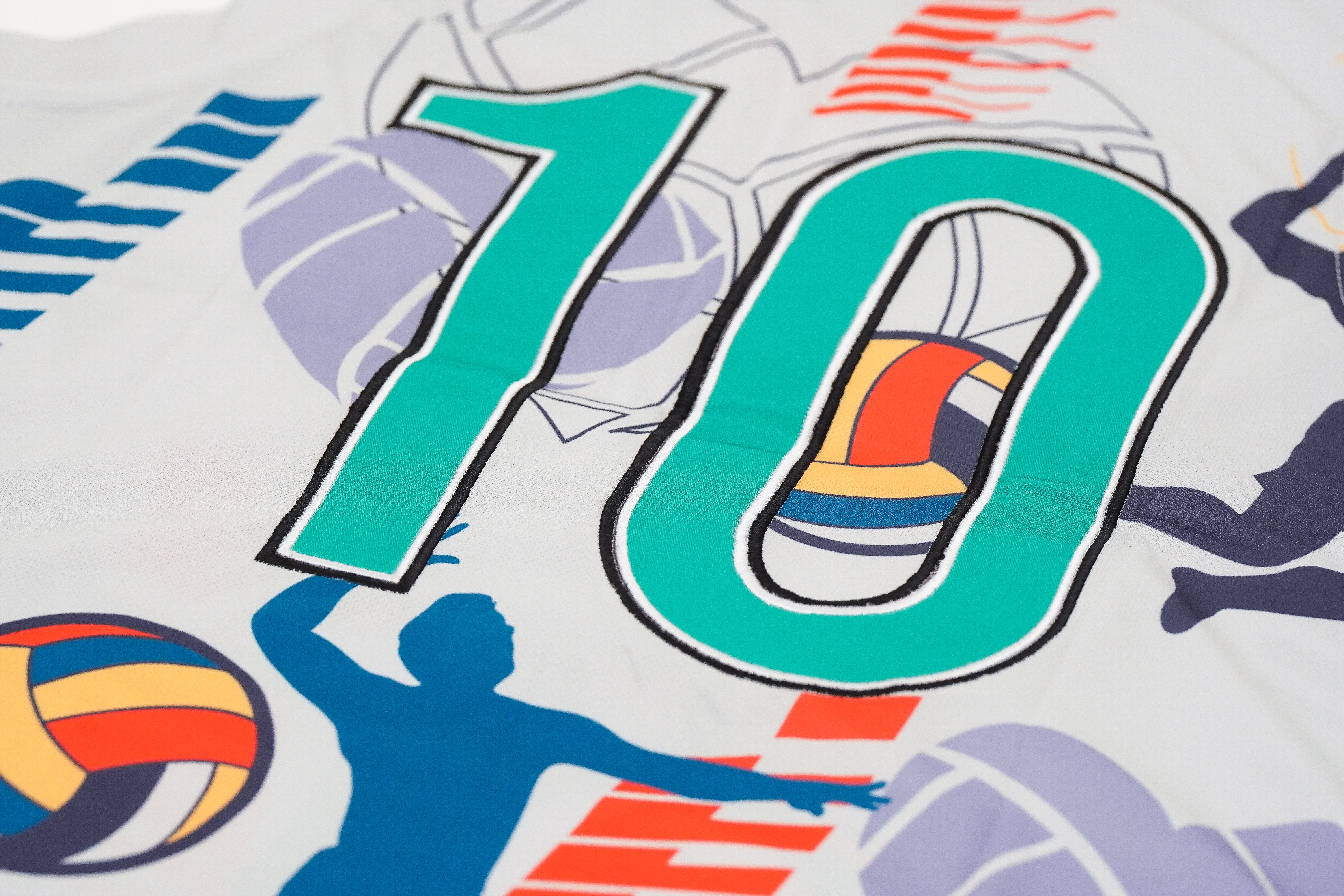 Colorful sports-themed design with number '10' and abstract shapes