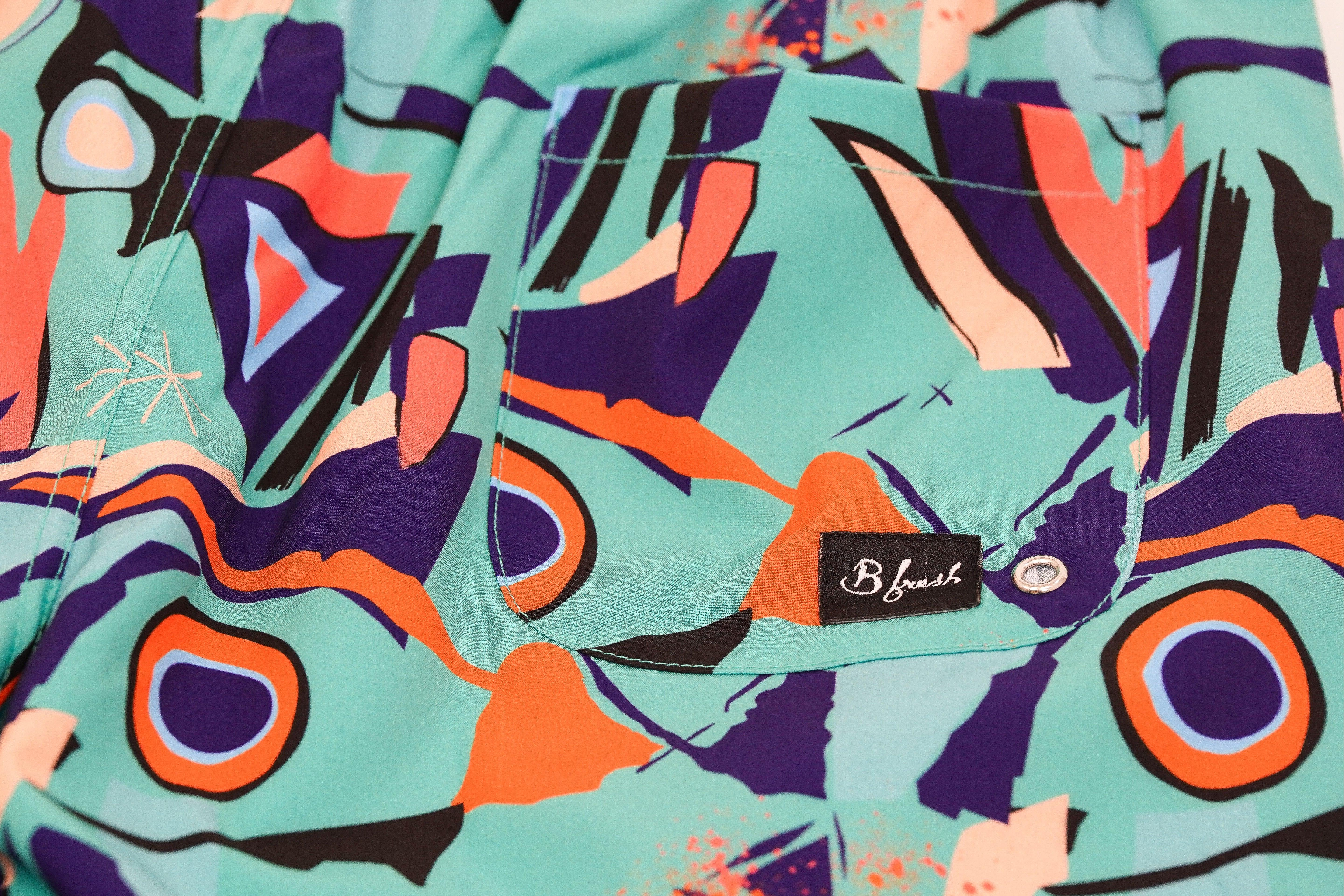 Abstract patterned shirt with a brand logo on a close-up view