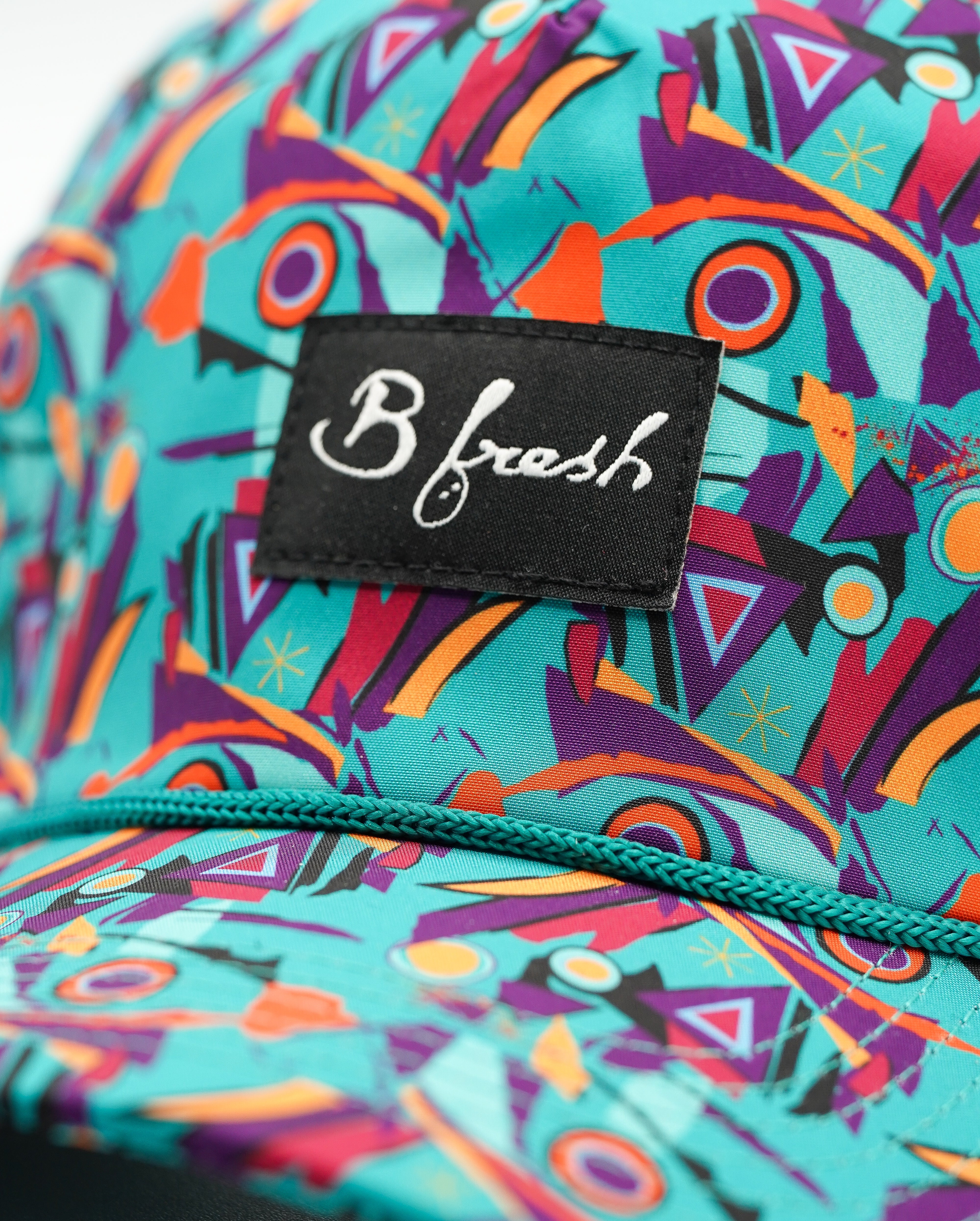 orange and green lightweight cap