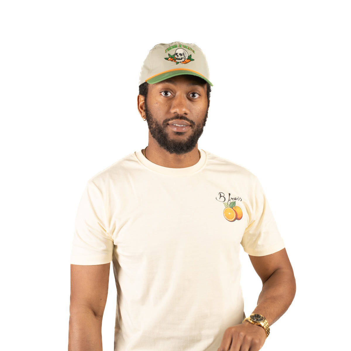 Fresh 2 Death hat design with skulls and oragnes