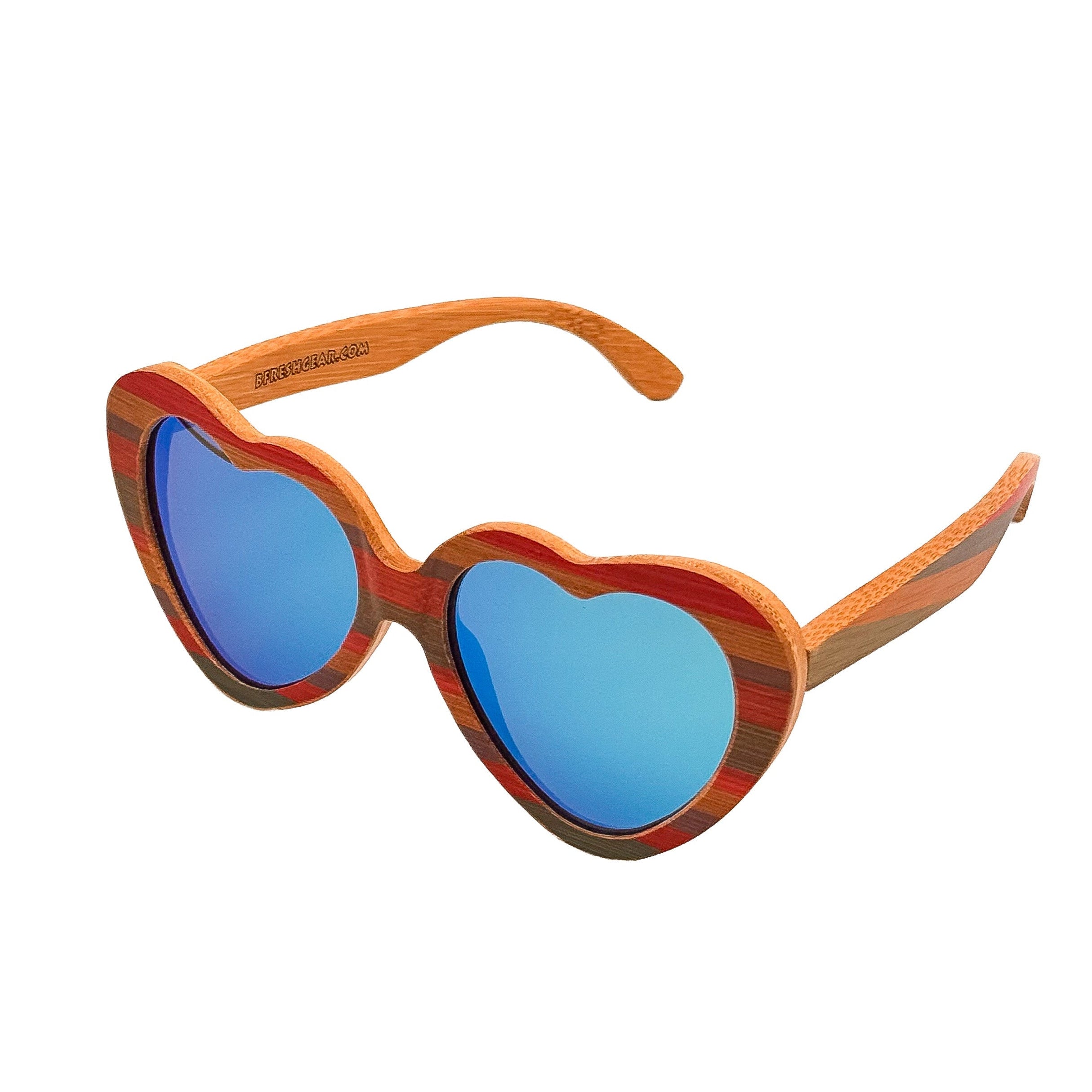 Heart-shaped sunglasses with a striped wood frame in orange, red, and brown tones, and blue mirrored lenses, shown on a plain white background.