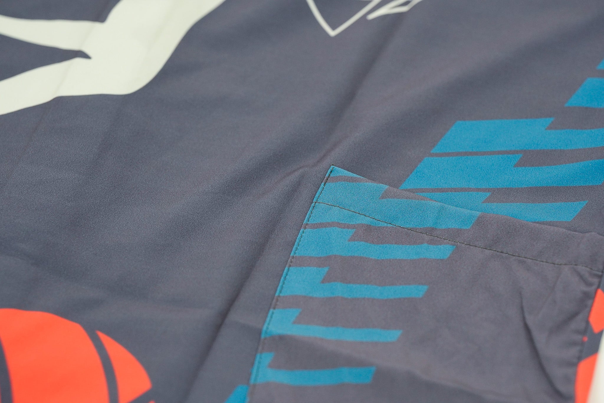 Close-up pocket of a fabric with colorful graphics 