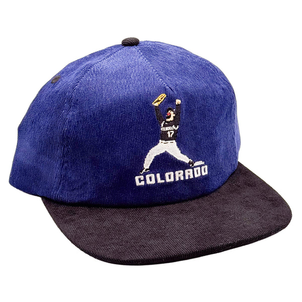 A Indigo corduroy baseball cap with a dark charcoal flat brim, featuring an embroidered Colorado Rockies Todd Helton 