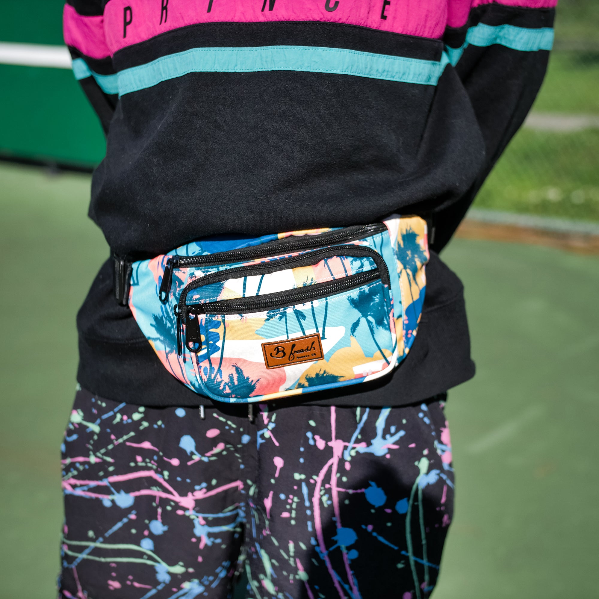 Beach Bum Fanny Pack - 80s inspired retro beach miami style fanny pack with blue yellow pink palm trees and beaches.  B Fresh Gear
